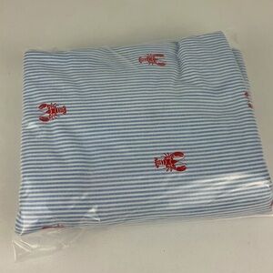 Twin size flat sheet. Red lobsters with blue and white stripes. 100% cotton